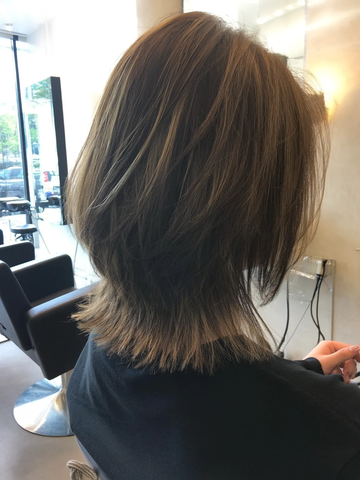 Medium Layered Chestnut Cut with Honey Blonde Highlights